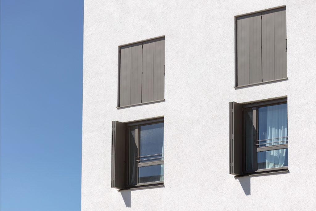 External Blind, Sliding Shutter, Modern Shutter on Window of Modern Residential Building.